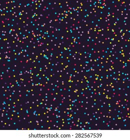 Seamless background with many tiny star-shaped confetti pieces