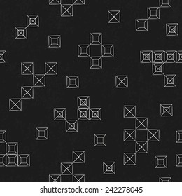 seamless background with modern geometric squares pattern on an old chalk blackboard