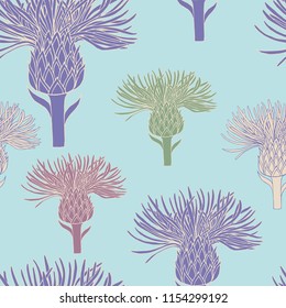Seamless background of multi-colored abstract flowers. Individual flowers on a blue background.
