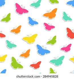 Seamless background with multi-colored butterflies. Vector illustration.