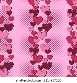 Seamless background with multicolored hearts on a pink background