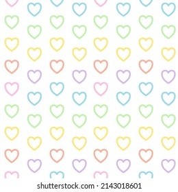 Seamless background with multicolored hearts pattern.