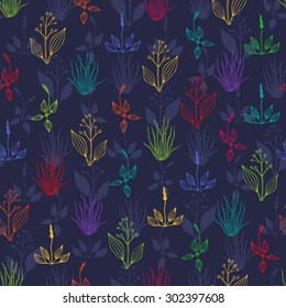 Seamless background with multicolored herbs on dark blue backdrop 
