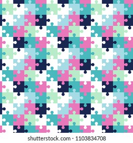 Seamless background from multi-colored pieces of puzzles. Pattern