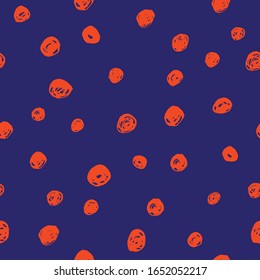 Seamless background with orange dots on a blue background. Vector. Design for wrapping paper and printing on fabrics.