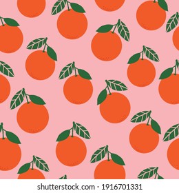 seamless background of oranges. pink background. ripe oranges with leaves .vector texture.bright print for textiles and wallpaper.