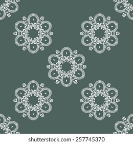 Seamless background with ornament. Wallpaper pattern