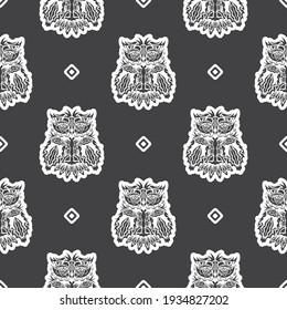 Seamless background with owls. Exclusive style. Good for T-shirts, postcards and prints. Vector illustration.