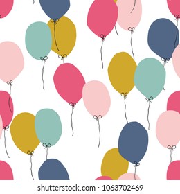 Seamless background with party balloons of different colors. Perfect for kids design, fabric, wrapping, wallpaper, textile, apparel.