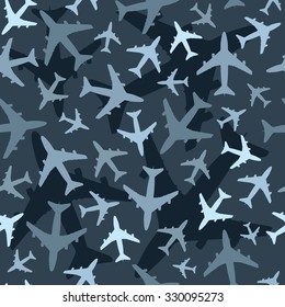 Seamless background pattern with airplanes. Dark blue camouflage version. Vector.