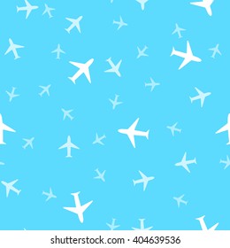 Seamless background pattern of airplanes in the sky.  Air travel symbol. Vector illustration