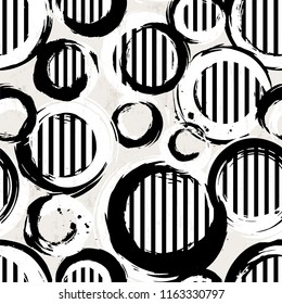 seamless background pattern, with circles, stripes, strokes and splashes, black and white