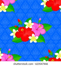 Seamless background pattern with decorative hibiscus flowers and leaves on a blue background. Vector illustration.