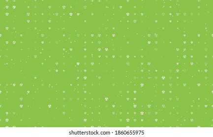 Seamless background pattern of evenly spaced white radiation symbols of different sizes and opacity. Vector illustration on light green background with stars