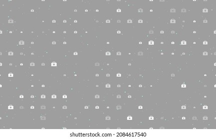 Seamless background pattern of evenly spaced white first aid symbols of different sizes and opacity. Vector illustration on gray background with stars