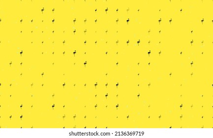 Seamless background pattern of evenly spaced black flamingos symbols of different sizes and opacity. Vector illustration on yellow background with stars