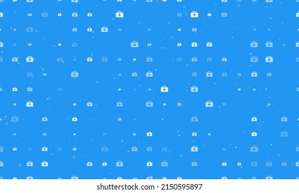 Seamless background pattern of evenly spaced white first aid symbols of different sizes and opacity. Vector illustration on blue background with stars