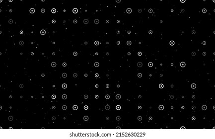 Seamless background pattern of evenly spaced white astrological sun symbols of different sizes and opacity. Vector illustration on black background with stars