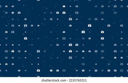 Seamless background pattern of evenly spaced white first aid symbols of different sizes and opacity. Vector illustration on dark blue background with stars
