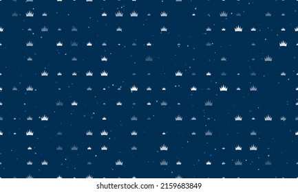 Seamless background pattern of evenly spaced white crown symbols of different sizes and opacity. Vector illustration on dark blue background with stars