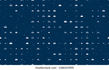 Seamless background pattern of evenly spaced white sports bag symbols of different sizes and opacity. Vector illustration on dark blue background with stars