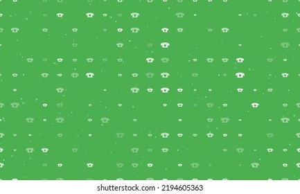 Seamless background pattern of evenly spaced white vintage telephone symbols of different sizes and opacity. Vector illustration on green background with stars