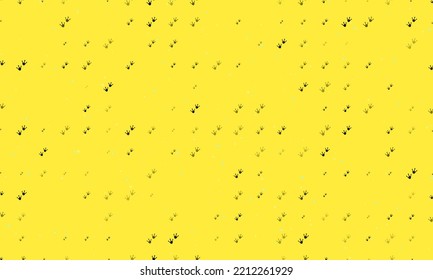 Seamless background pattern of evenly spaced black frog tracks symbols of different sizes and opacity. Vector illustration on yellow background with stars