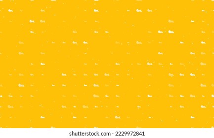Seamless background pattern of evenly spaced white bulldozer symbols of different sizes and opacity. Vector illustration on amber background with stars