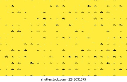 Seamless background pattern of evenly spaced black road roller symbols of different sizes and opacity. Vector illustration on yellow background with stars