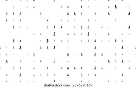 Seamless background pattern of evenly spaced black rockets of different sizes and opacity. Vector illustration on white background