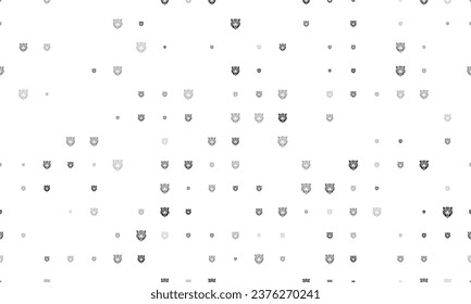 Seamless background pattern of evenly spaced black tiger head symbols of different sizes and opacity. Vector illustration on white background