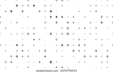 Seamless background pattern of evenly spaced black airplane symbols of different sizes and opacity. Vector illustration on white background