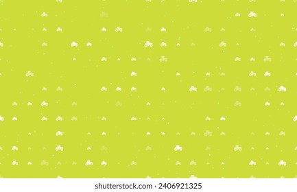 Seamless background pattern of evenly spaced white tractor icons of different sizes and opacity. Vector illustration on lime background with stars