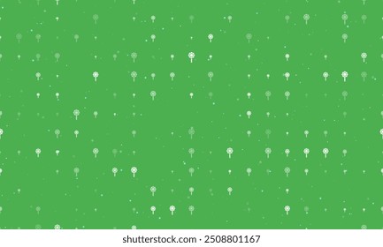 Seamless background pattern of evenly spaced white chamomile symbols of different sizes and opacity. Vector illustration on green background with stars