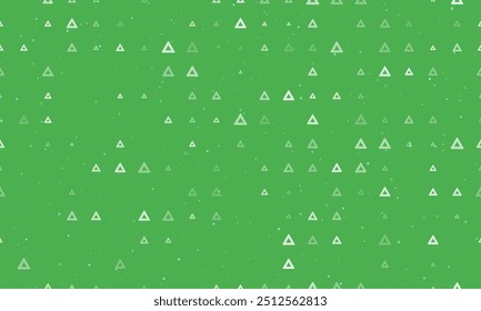 Seamless background pattern of evenly spaced white emergency stop signs of different sizes and opacity. Vector illustration on green background with stars