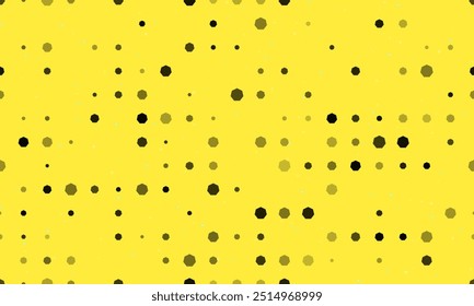 Seamless background pattern of evenly spaced black heptagon symbols of different sizes and opacity. Vector illustration on yellow background with stars