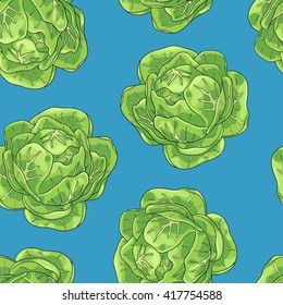 Seamless background with a pattern of fresh head of green cabbage