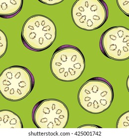 Seamless background with a pattern of fresh raw ripe sliced eggplant