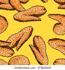 Seamless background with a pattern of fried chicken wings