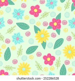 Seamless background with a pattern of funny drawn pink, blue and yellow flowers and green leaves