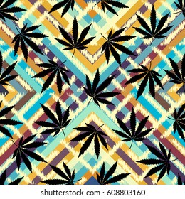 Seamless background pattern. Grunge ethnic background and hemp leaves.