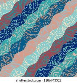 Seamless background pattern. Grunge paisley pattern in collage patchwork style. Ethnic indian style.