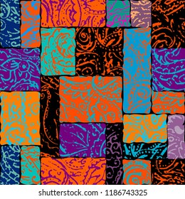 Seamless background pattern. Grunge paisley pattern in collage patchwork style. Ethnic indian style.
