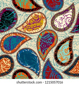 Seamless background pattern. Grunge paisley pattern in collage patchwork style. Ethnic indian style.