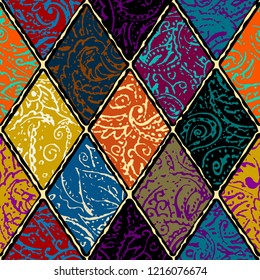 Seamless background pattern. Grunge paisley pattern in collage patchwork style. Ethnic indian style.