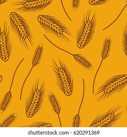 Seamless background with a pattern of hand drawn ears of barley grain cereal