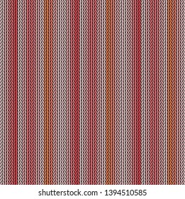 Seamless background pattern. Knitted multicolored texture.