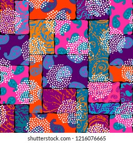 Seamless background pattern. Patchwork pattern with Paisley ornament patterns. Bright magenta and orange colors. Ethnic indian style.