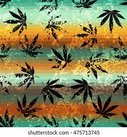 Seamless background pattern. Rastafarian colors pattern and grunge hemp leaves.