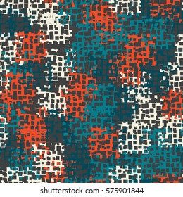 Seamless background. The pattern of squares. Chaotic Spot. Fashion camouflage. Grungy textiles.